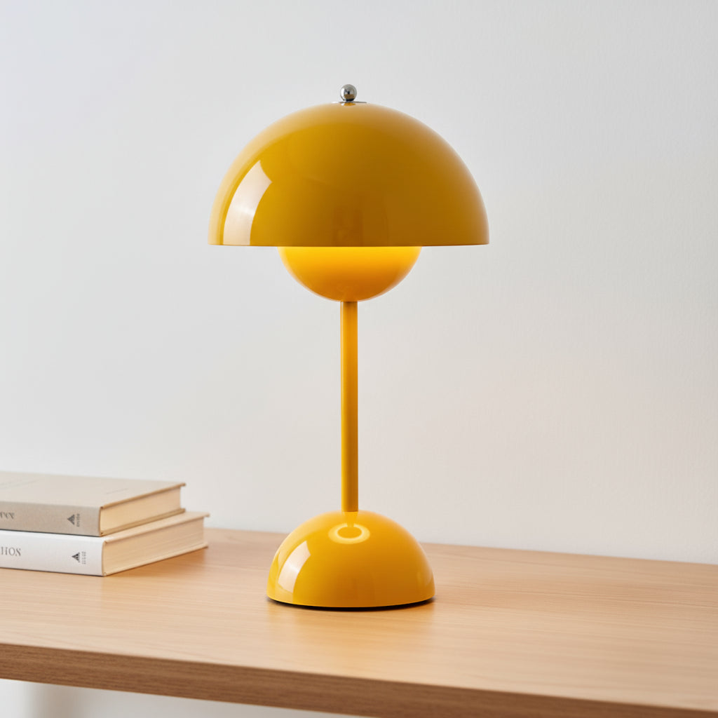 Yellow table lamp on a wooden surface with a white background